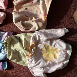 Striped Pink and White Sweatshirt with Yellow Flower